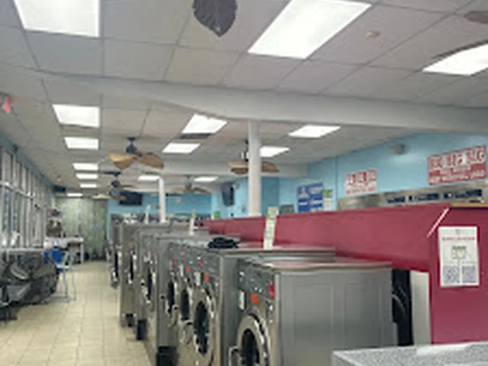 Tropical Breeze Coin Laundromat And Wash And Fold